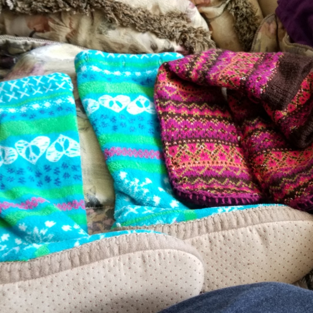 Two pair of poem slippers for inside